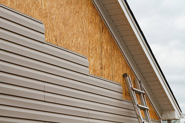 Professional Siding Replacement technician working in Renovo, PA